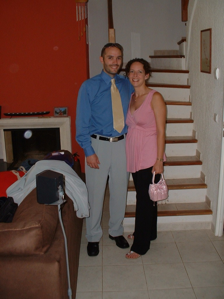 2006: On our way to a friend's wedding, 5 months pregnant with L.