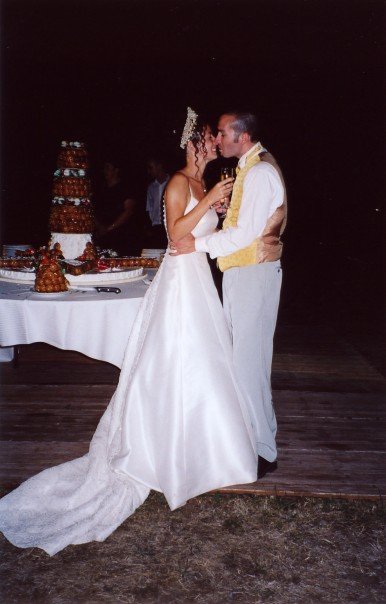 Hubs and I on our wedding day (next to our French wedding cake)