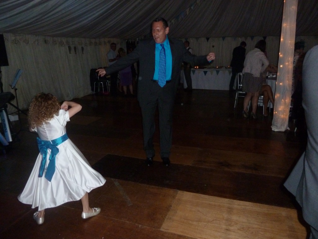 Dancing to "Play that funky music white boy" with her Uncle