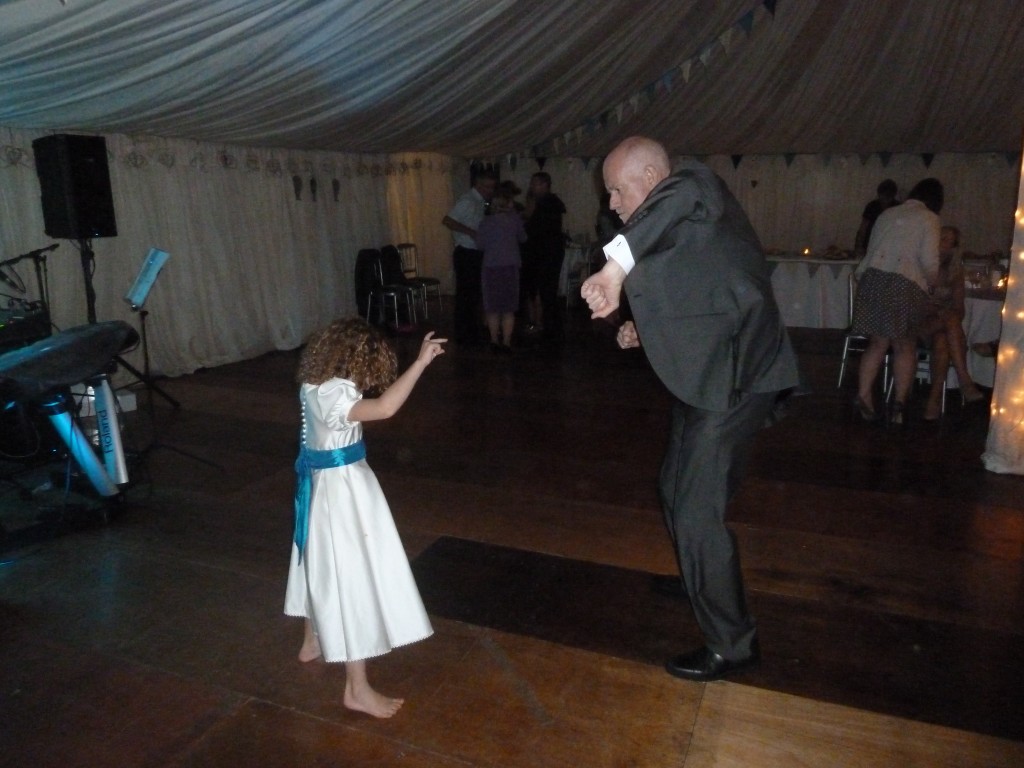 Throwing some shapes with Grandpa on the dancefloor