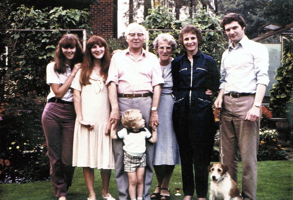 Grandpa with Grandma, 4 of their children, 1 of their grandchildren and their dog (my mum is in the fetching jumpsuit), around 1980