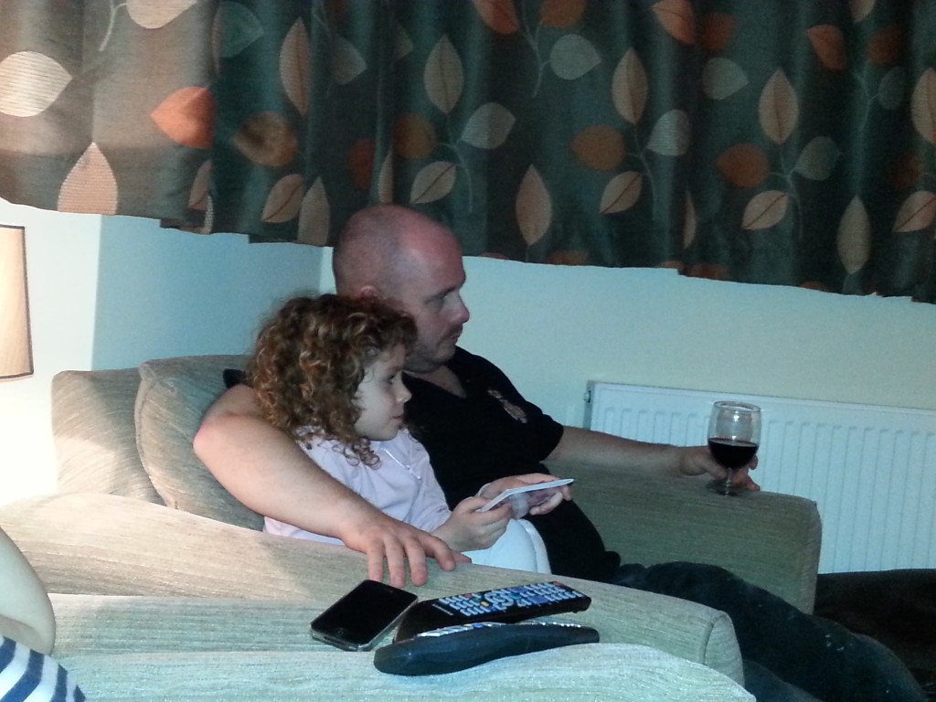 L with her Uncle A watching Toy Story