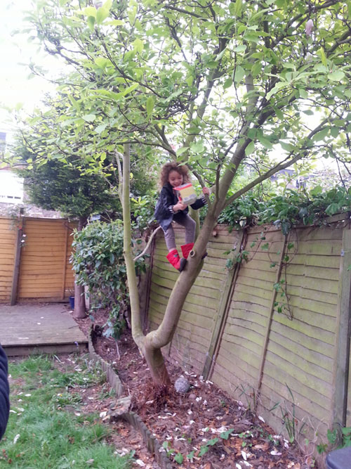 L hunting for Easter Eggs in "her" tree in our garden  #genderstereotypes www.FranglaiseMummy.com 