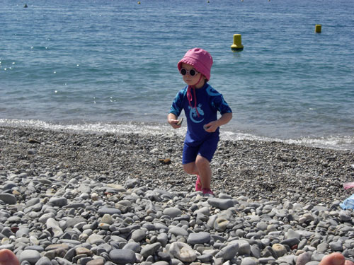 Girl on the beach in Nice #FrenchRiviera www.FranglaiseMummy.com