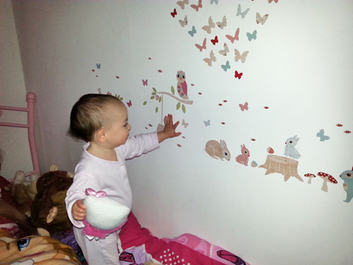 Baby playing with Tinyme wall stickers www.FranglaiseMummy.com