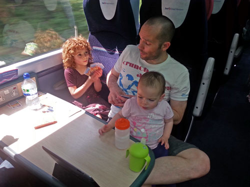 Father & daughter playing cards on the train www.FranglaiseMummy.com