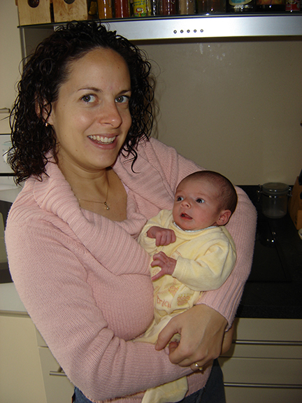 Mum holding newborn baby: To my 9 year old daughter - 13 things you need to know about life l www.FranglaiseMummy.com l French and English Parenting and Lifestyle Ramblings